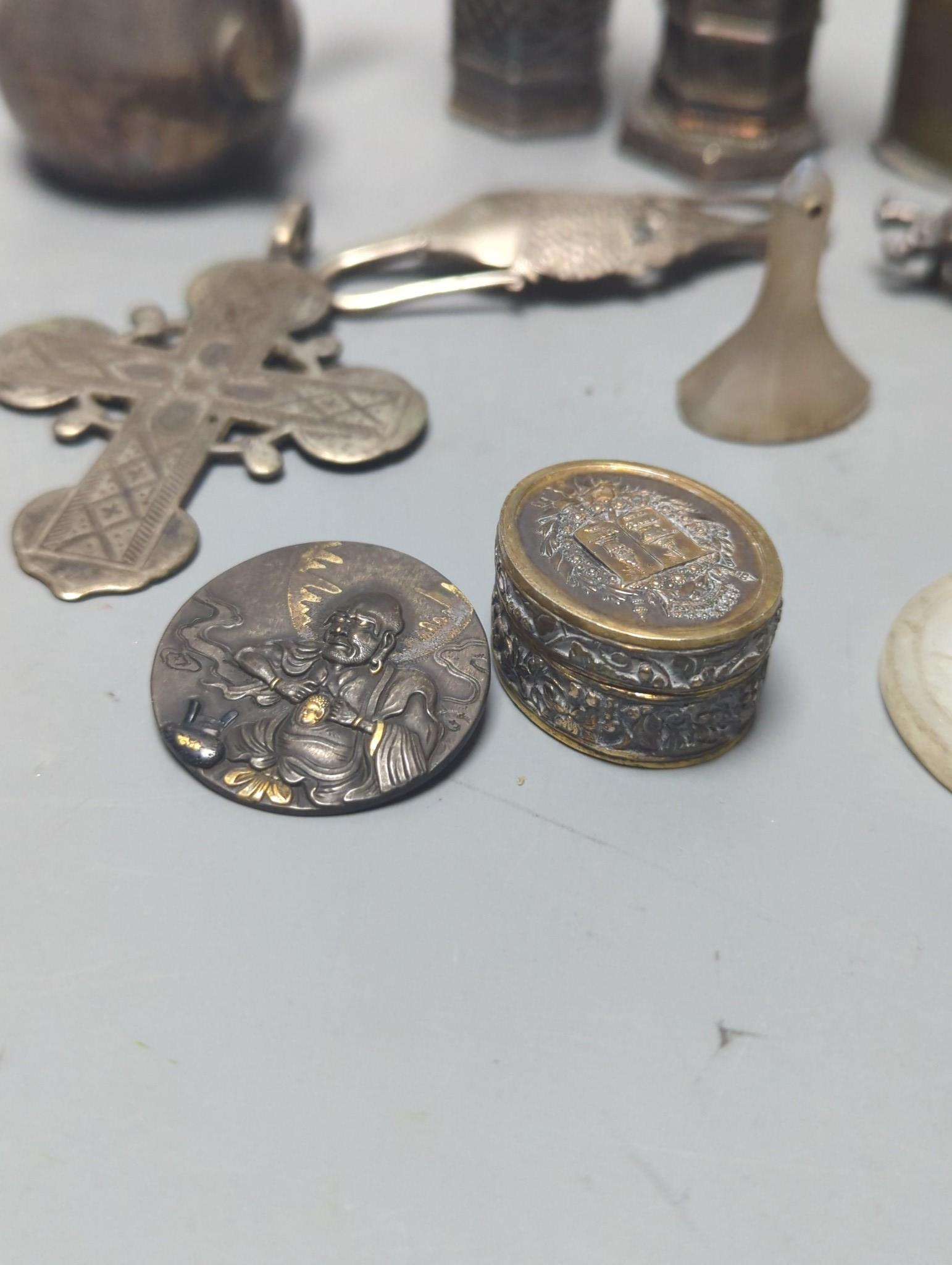 A group of Asian and other small collectables, white metal, brass etc